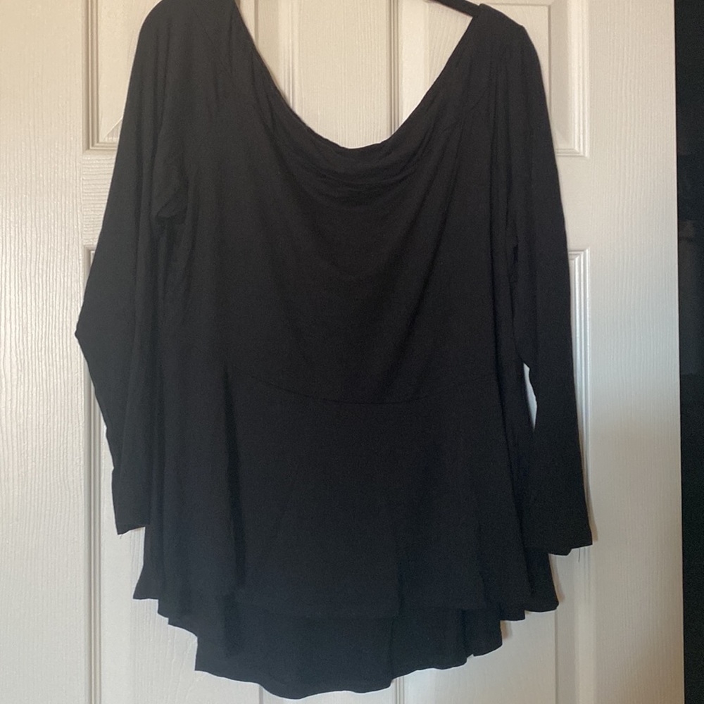 Fashion to figure black peplum jersey knit, long sleeve top. Size 2.